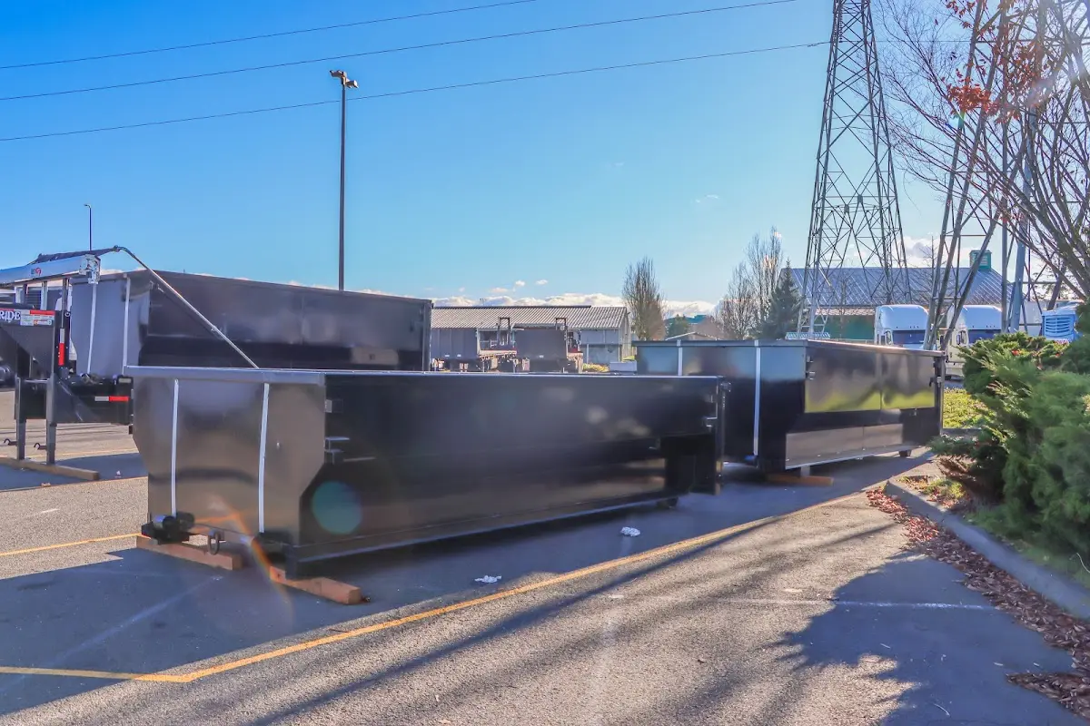 Roll-off dumpster ready for waste disposal at job site for 12 Yard Dumpster Rental in Lone Tree